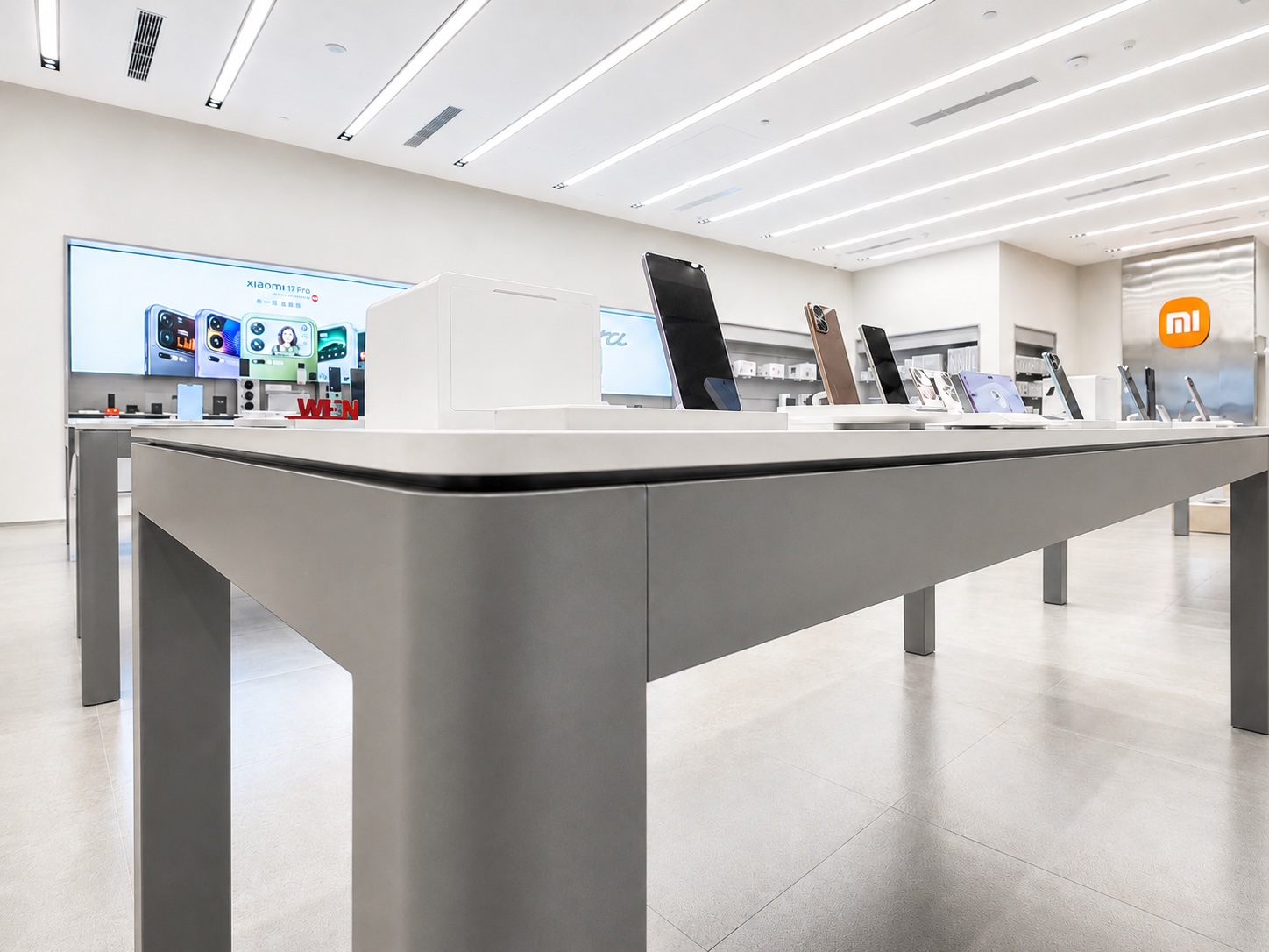 Xiaomi mobile experience table with smartphones, device supports and open product trial space