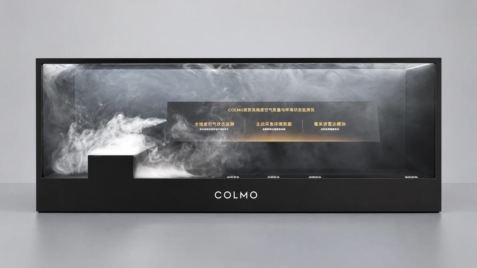 Front view of the COLMO enclosure with visible mist, control buttons and branded base
